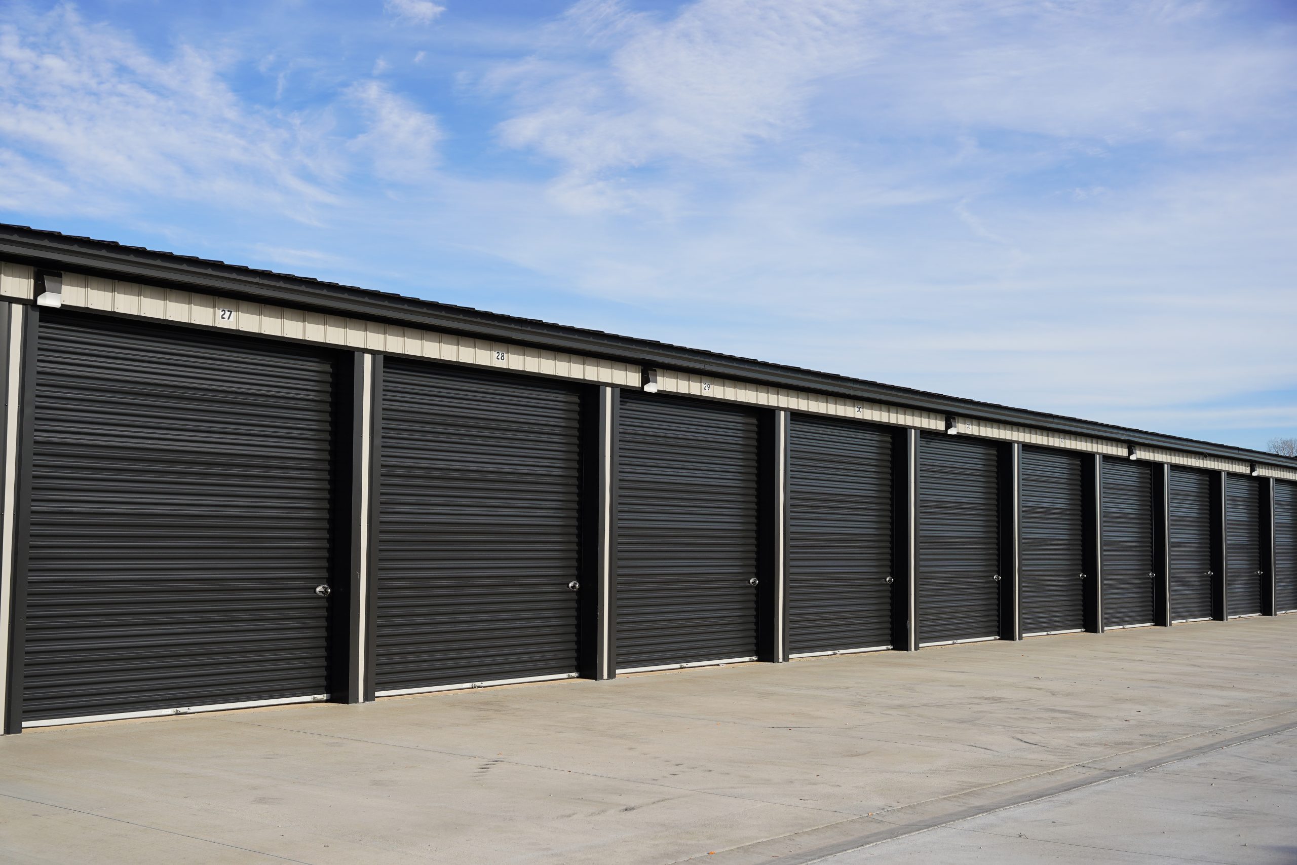 Storage units showing bay doors and wide access.